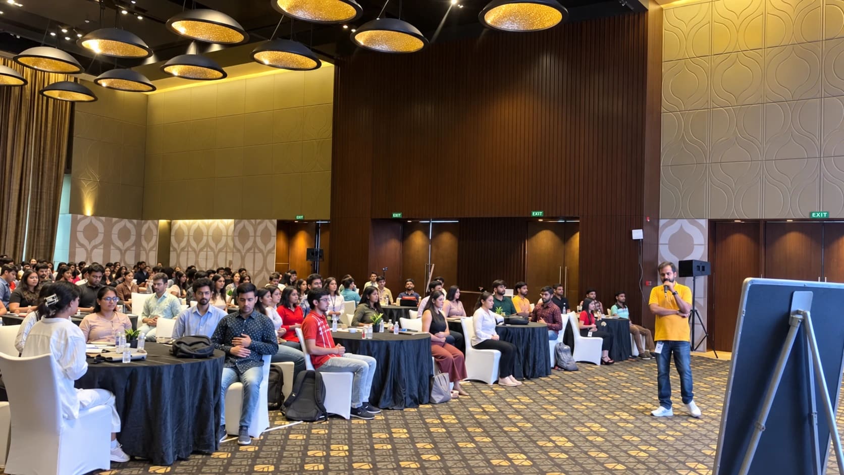A large conference or workshop session with many participants at PepsiCo.